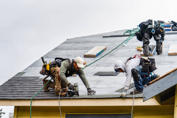 Professional Gutter Installation technician working in Marion, KS